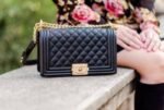 First Copy Chanel Classic Black Quilted Flap Bag With Gold Turn Lock And Chain Strap