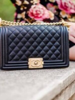 First Copy Chanel Classic Black Quilted Flap Bag With Gold Turn Lock And Chain Strap